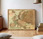 The image is a framed vintage map of Europe, depicting the continent and surrounding seas.