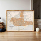 The image is a framed map of Toronto, Canada, showing the city's streets and surrounding areas.