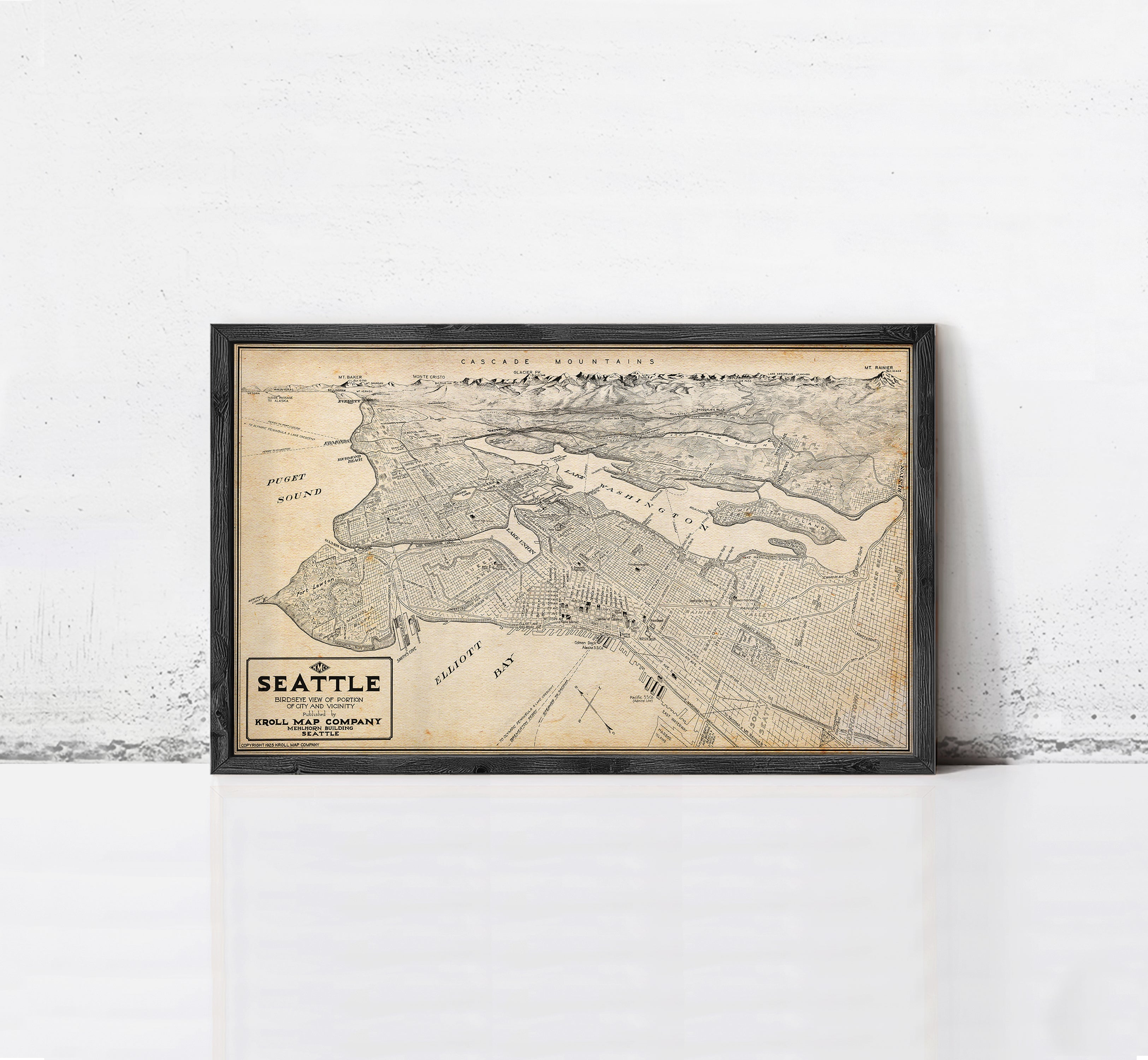 The image is a framed map of Seattle, Washington, with the text "SEATTLE" and "KROLL META COMPANY" visible.