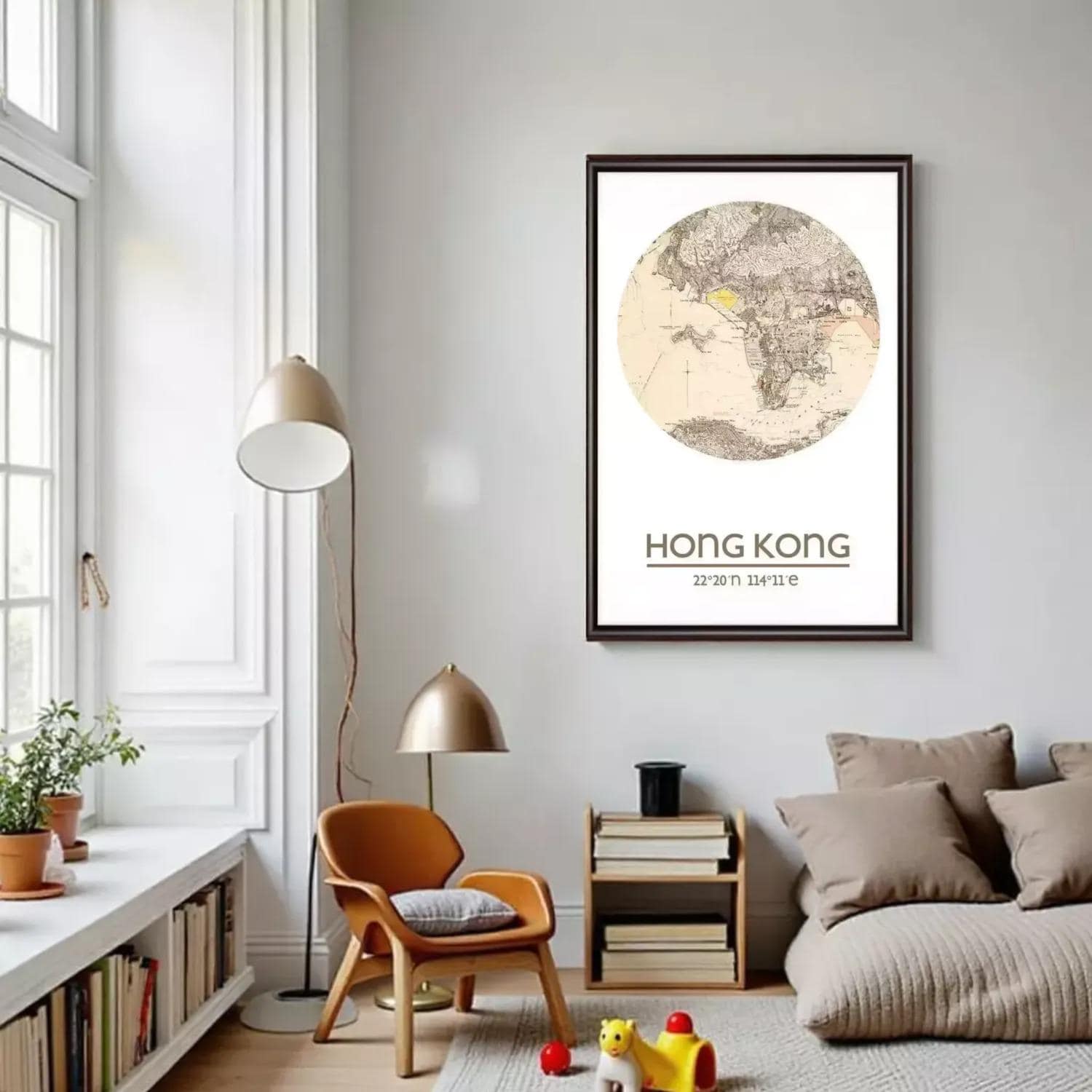 a cozy living room with a large framed map of Hong Kong hanging on the wall, a comfortable sofa, a wooden chair, and a bookshelf filled with books.