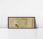 A framed map of Europe and the surrounding areas, with a detailed and colorful depiction of the continent and its countries.