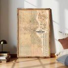 The image is a framed map of the Chicago area, showing the city's geographical layout and surrounding regions.
