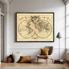 The image is a framed antique world map depicting the continents and oceans of the known world.
