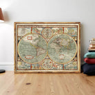 The image is a framed antique world map with intricate details and designs.