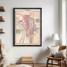 The image is a framed map of the city of Wichita, Kansas, depicting the layout of the city with streets, buildings, and other landmarks.