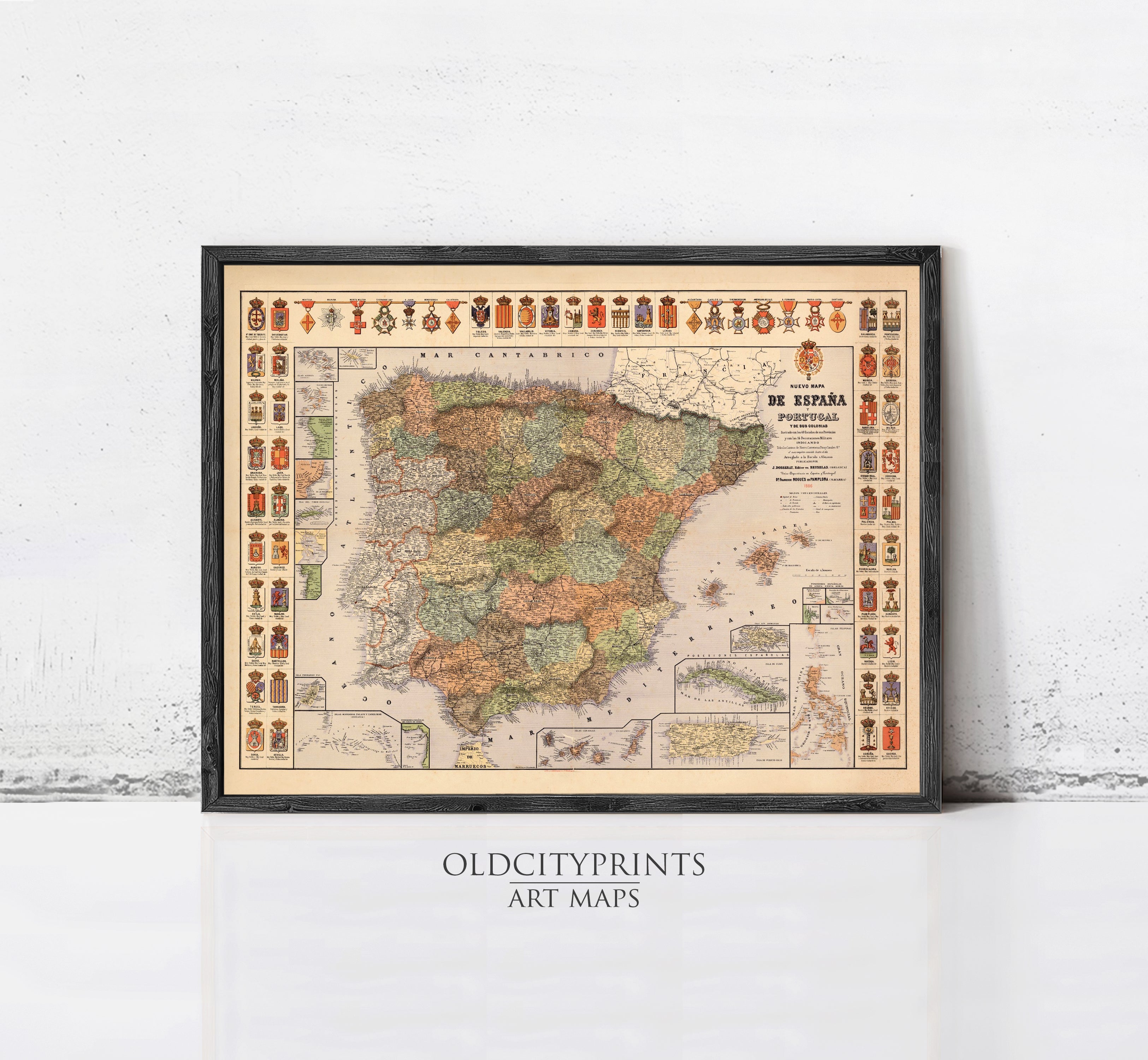 The image is a framed vintage map of Spain, featuring detailed illustrations and labels.