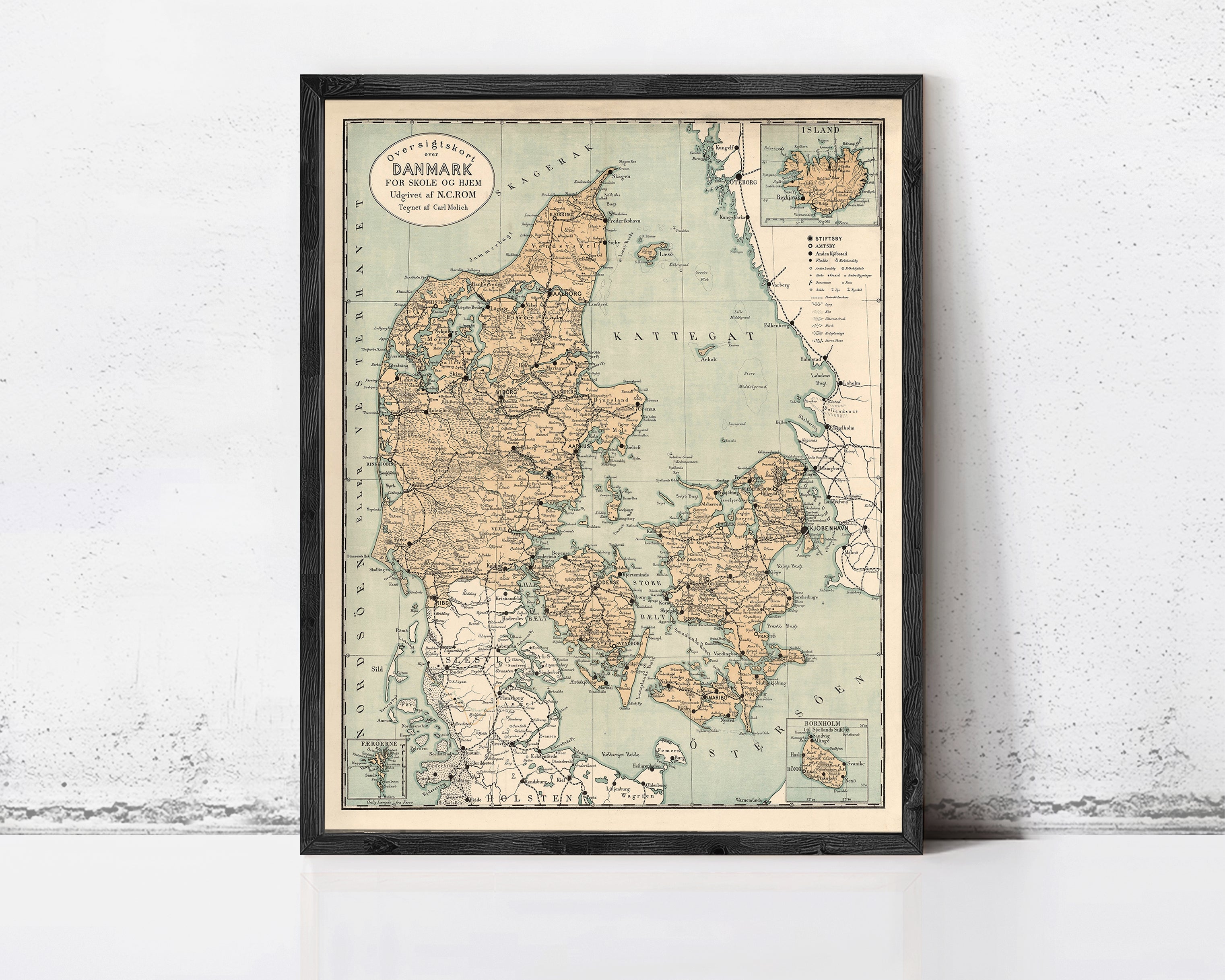 The image is a framed map of Denmark, showing the country's geographical layout and surrounding areas.