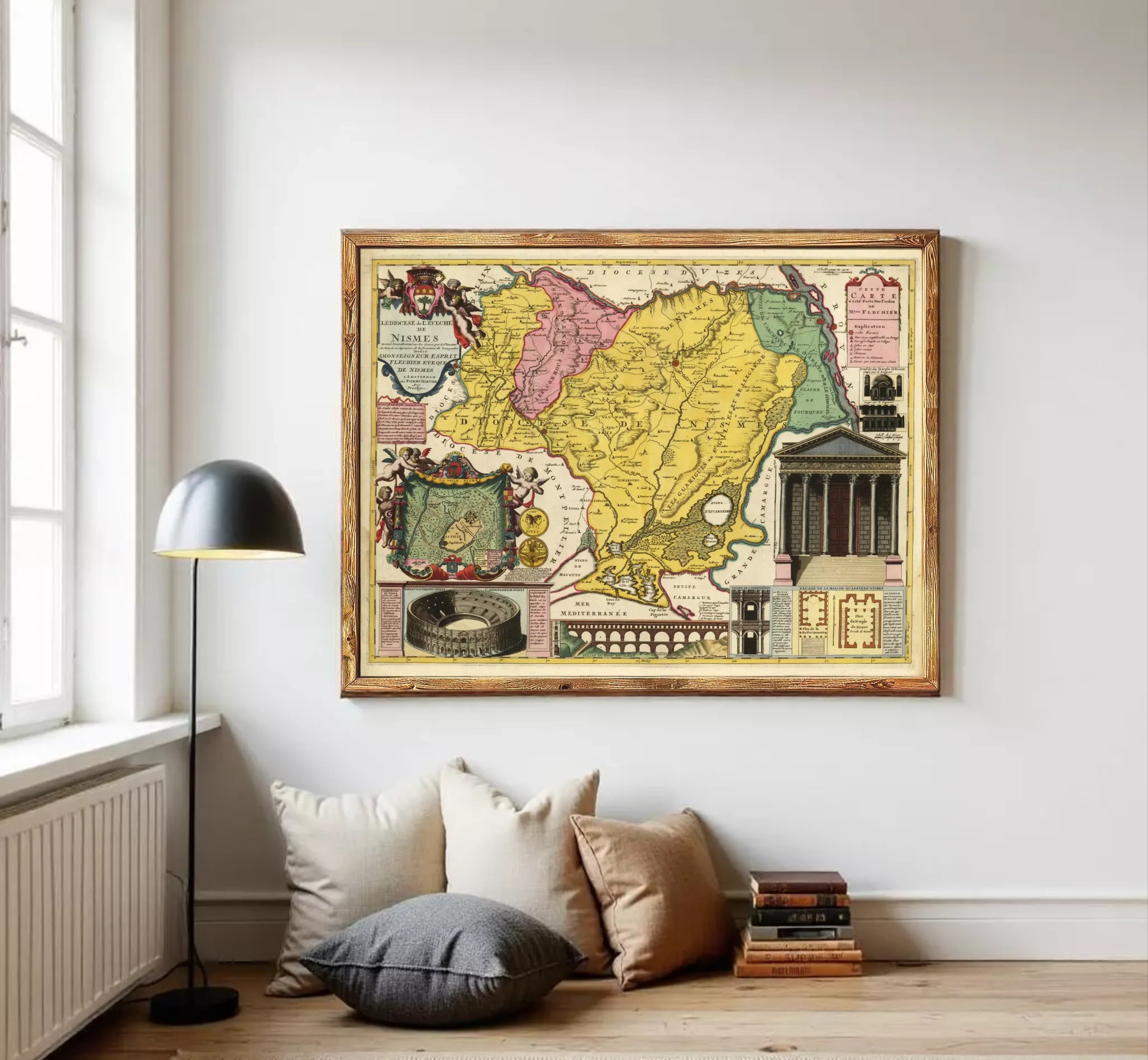 The image is a framed vintage map of the Nubia region, which includes illustrations of the Roman Colosseum, a temple, and other landmarks.