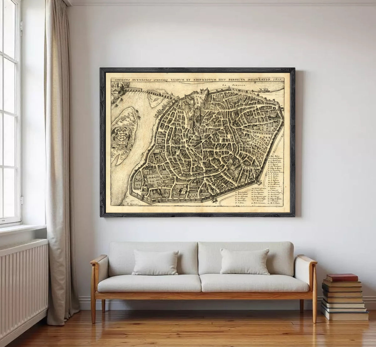 The image is a framed antique map of a city, likely from the 16th century, depicting a detailed layout of the city's streets and surrounding areas.