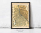 The image is a framed vintage map of Minneapolis, Minnesota, with a black border and a beige background.