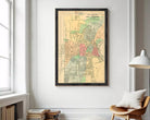 The image is a framed vintage map of the town of Hartford, Connecticut, showing the layout of the streets, neighborhoods, and other geographical features.