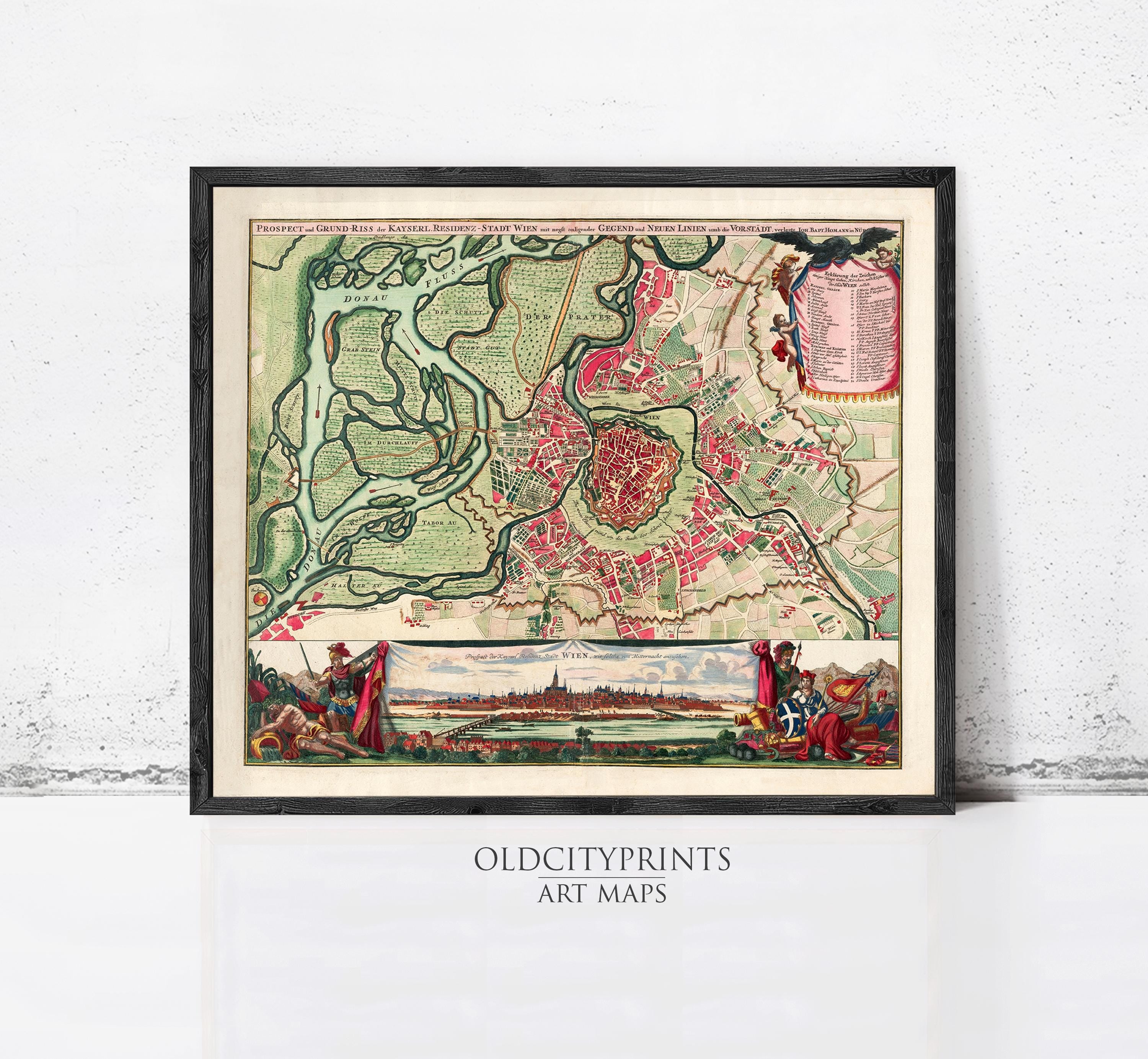 The image is a framed vintage map of a city, depicting a detailed layout of the streets, landmarks, and surrounding areas.