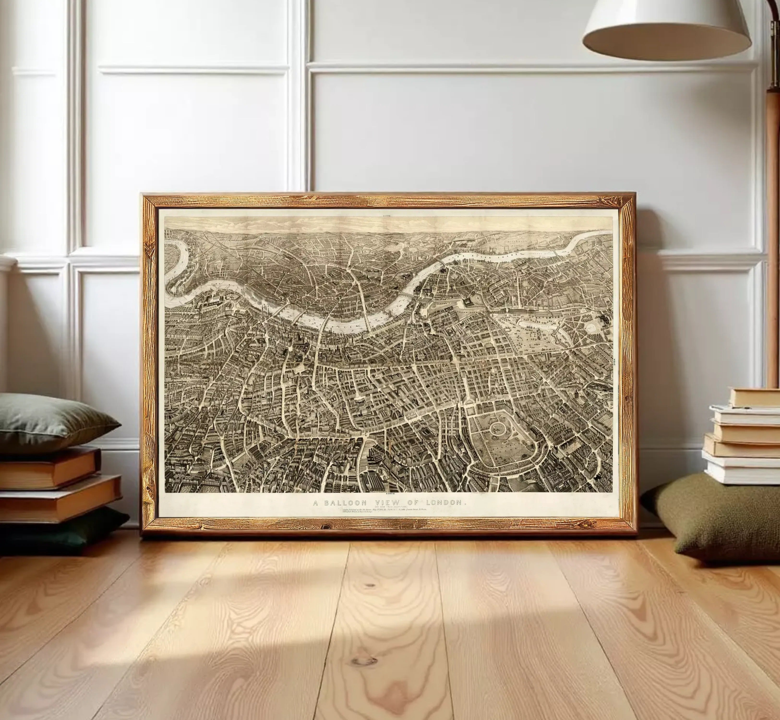 The image is a framed antique map of London, depicting the city's layout and streets.