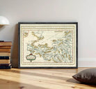 The image is a framed antique map of Europe, depicting the continent and surrounding areas in a detailed and intricate manner.