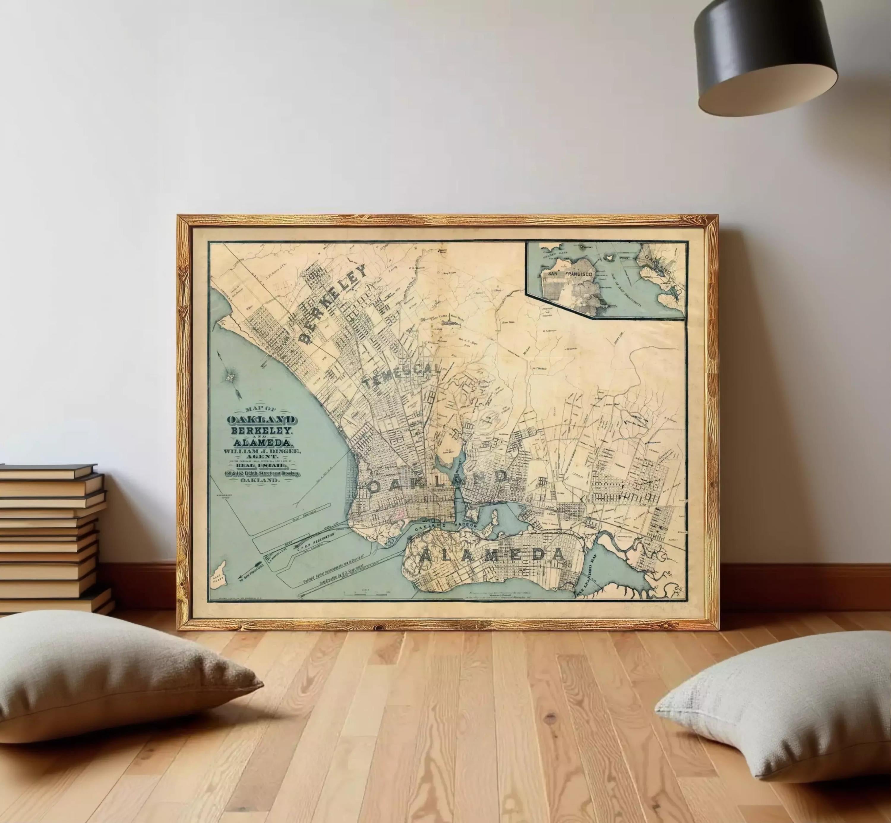 The image is a framed vintage map of Oakland, California, with a wooden frame.