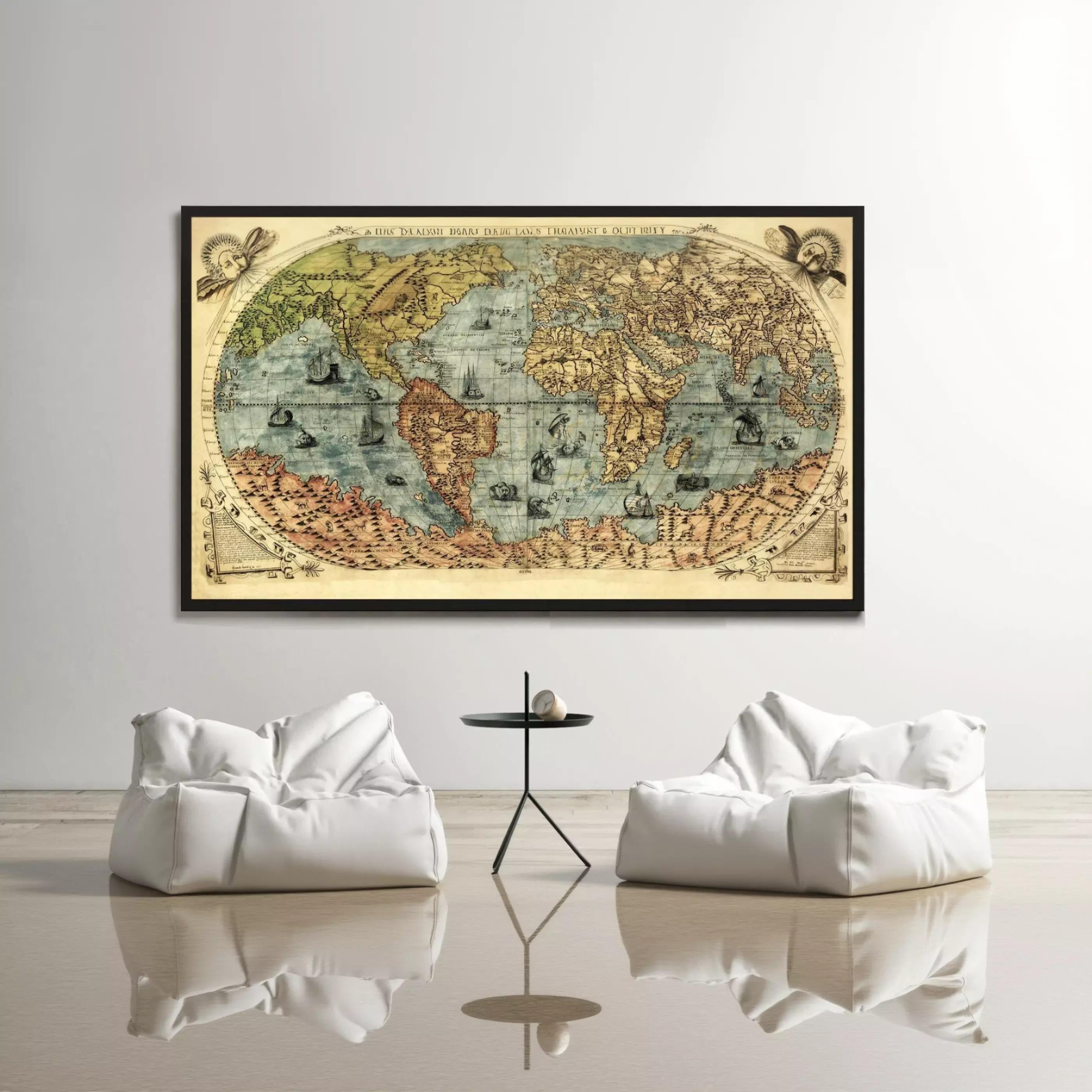 a large, vintage-style world map hanging on a wall, with two white bean bag chairs positioned in front of it.