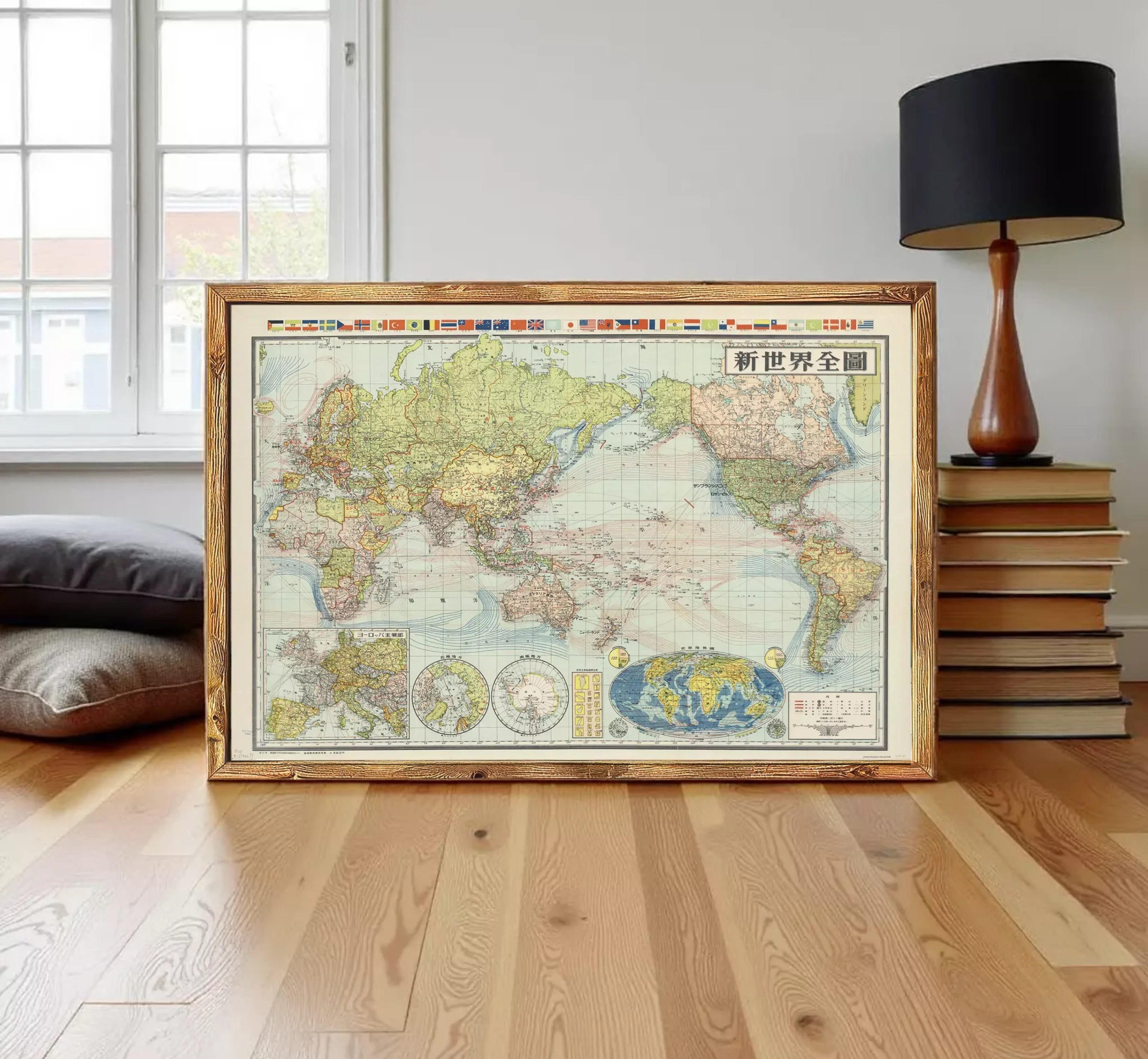 The image is a framed vintage map of the world, depicting various countries and regions with colorful borders and labels.