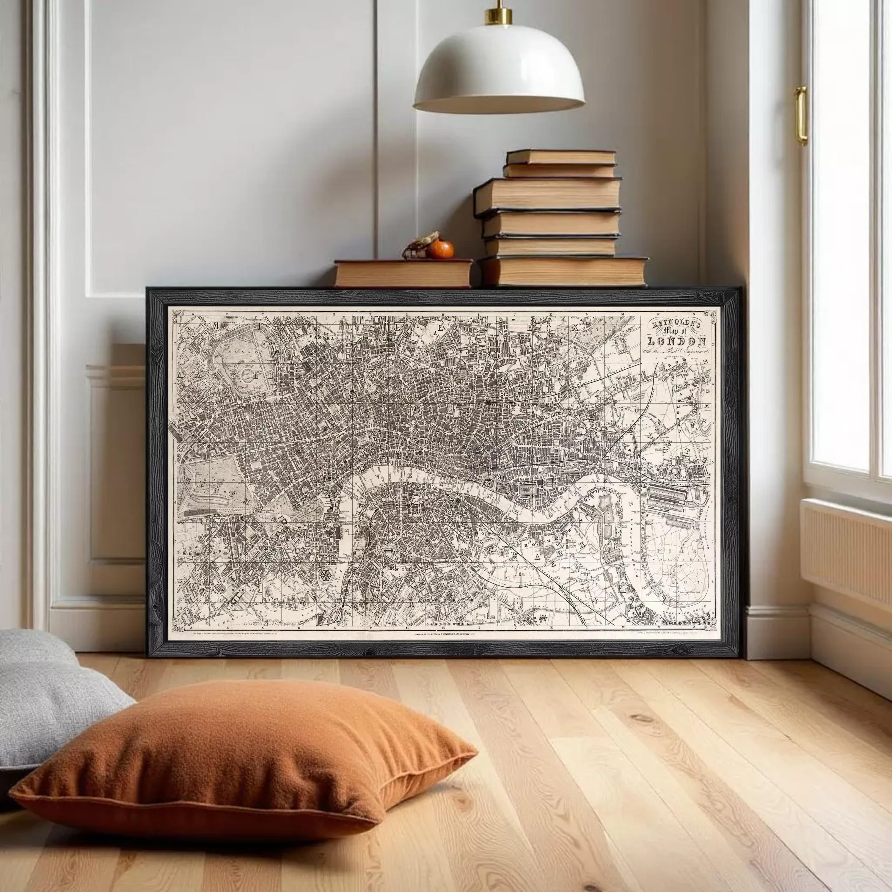 The image is a framed vintage map of London, England, depicting the city's streets and landmarks.