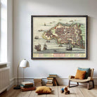The image is a framed vintage map of a coastal city, depicting various ships and boats in the surrounding waters.