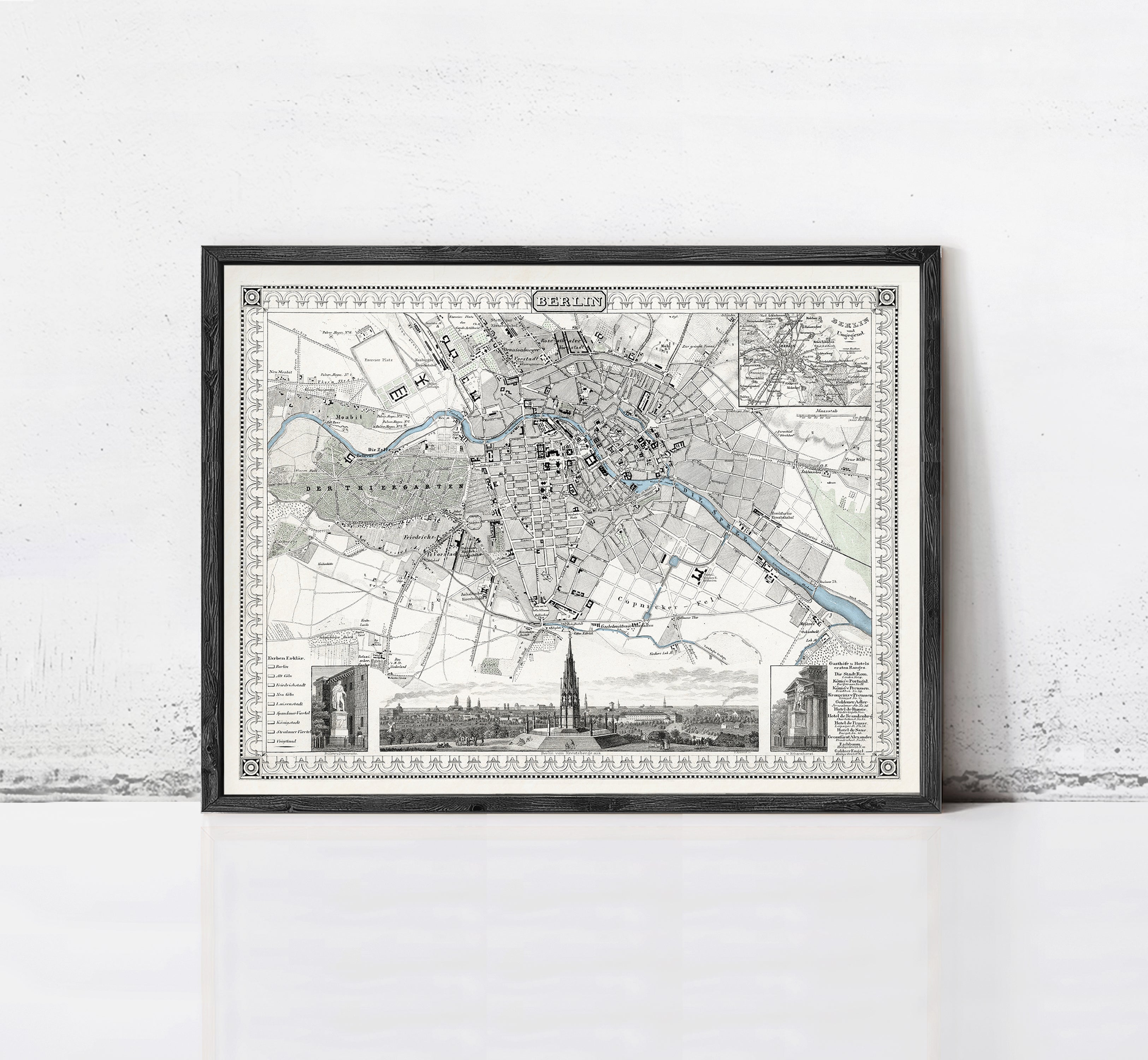 The image is a framed vintage map of Berlin, Germany, depicting the city's streets, landmarks, and surrounding areas.