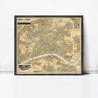 The image is a framed vintage map of the city of König, Germany, depicting the city's streets, landmarks, and surrounding areas.