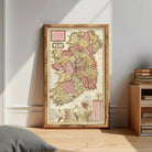 The image is a framed vintage map of Ireland, depicting the country's geographical layout and boundaries.