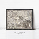 The image is a framed antique map of a city, likely from the past, with intricate details and a vintage appearance.