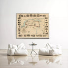 a large framed map hanging on a white wall, with two white bean bag chairs positioned in front of it.
