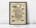 The image is a framed vintage map of Scotland, featuring detailed illustrations and labels.