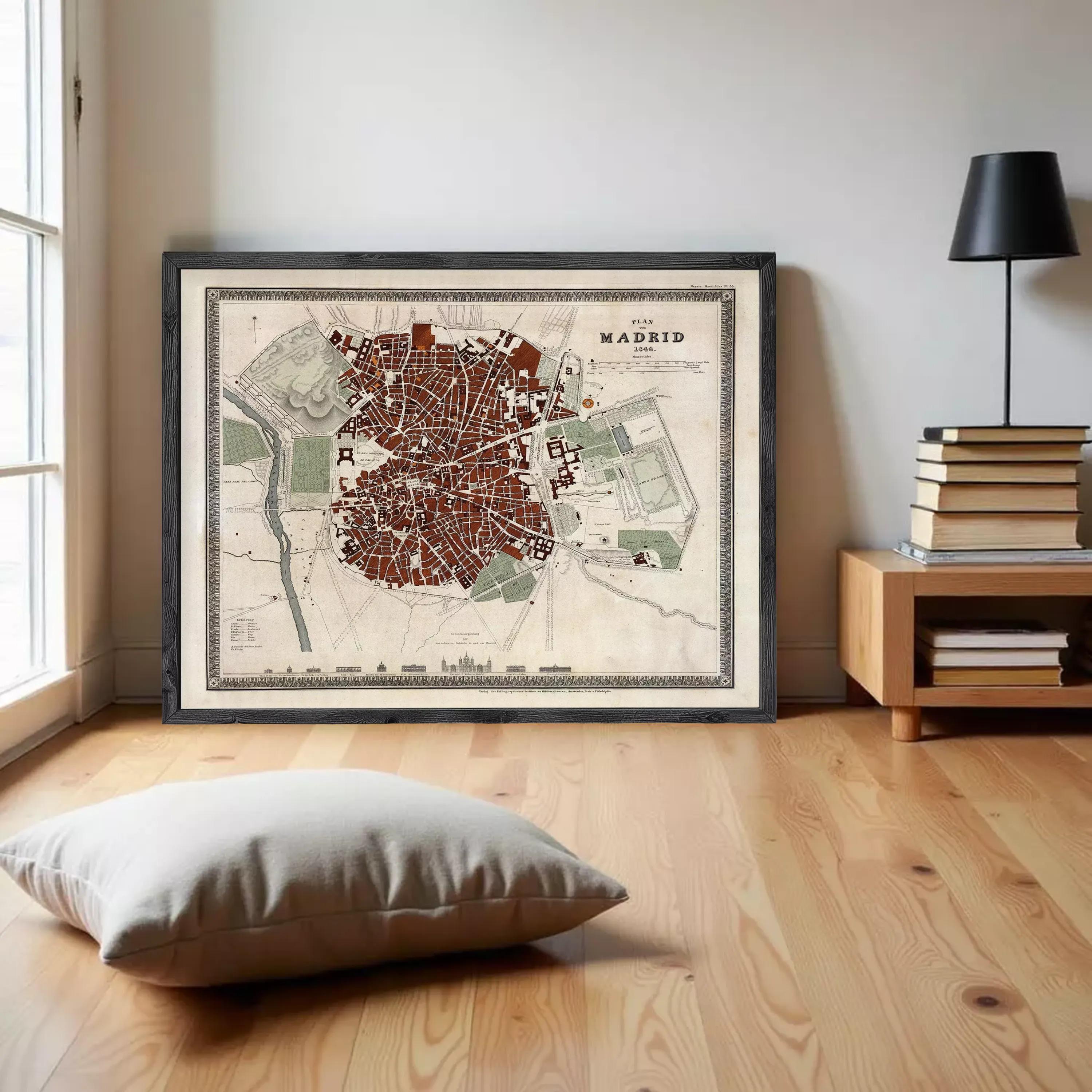The image is a framed map of Madrid, Spain, depicting the city's layout and surrounding areas.