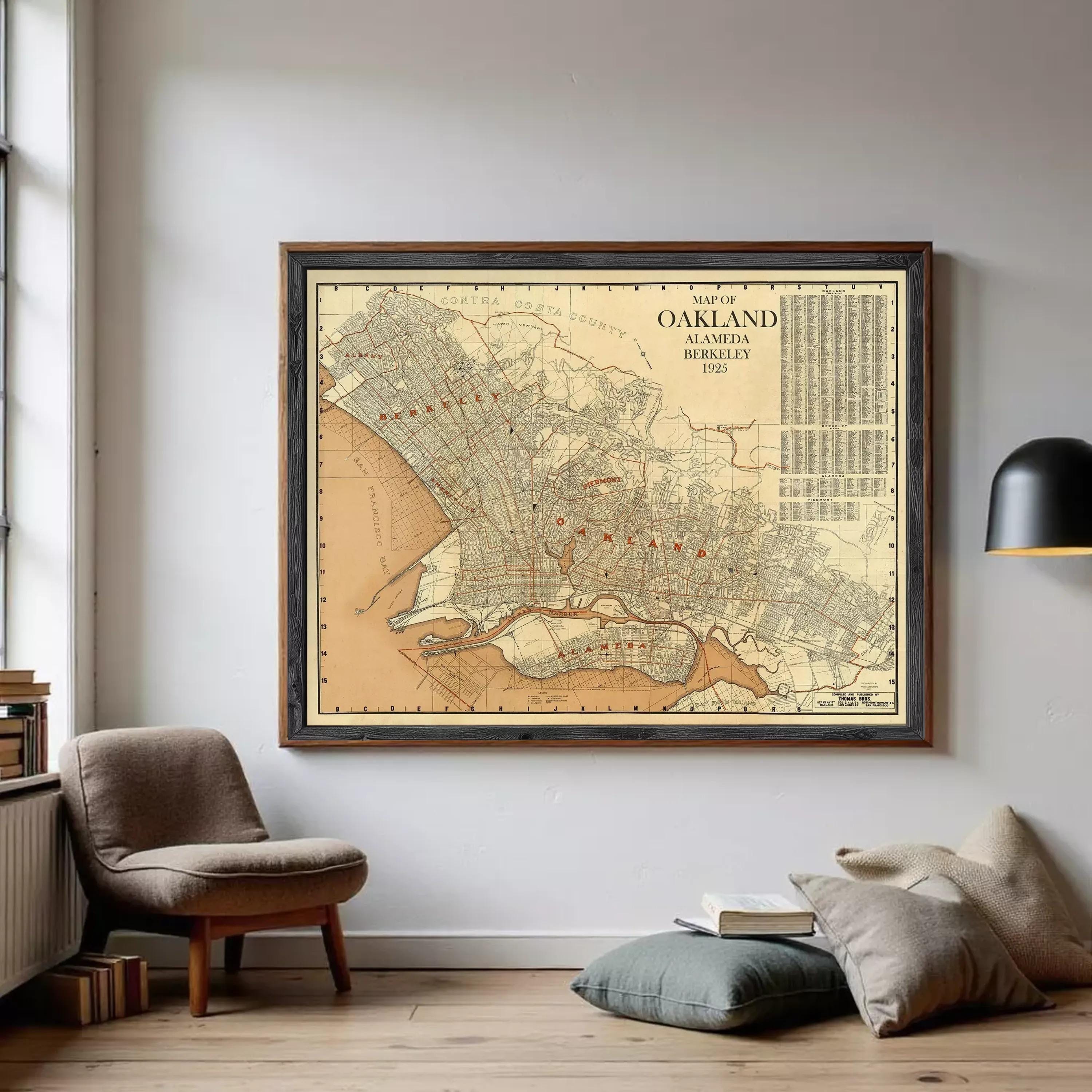 The image is a framed vintage map of Oakland, California, showing the city's streets and surrounding areas.