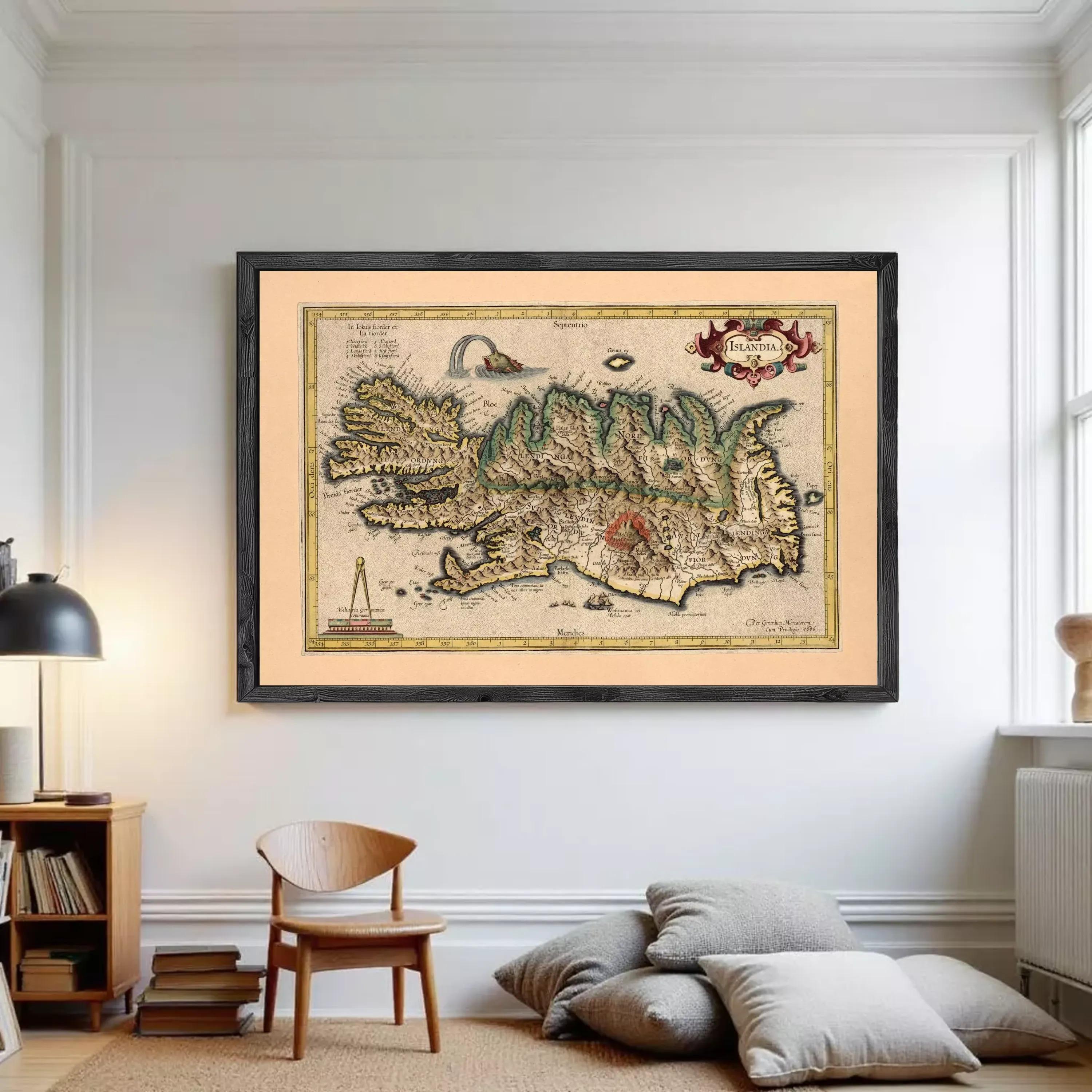 The image is a framed vintage map of Iceland, featuring detailed illustrations and labels.