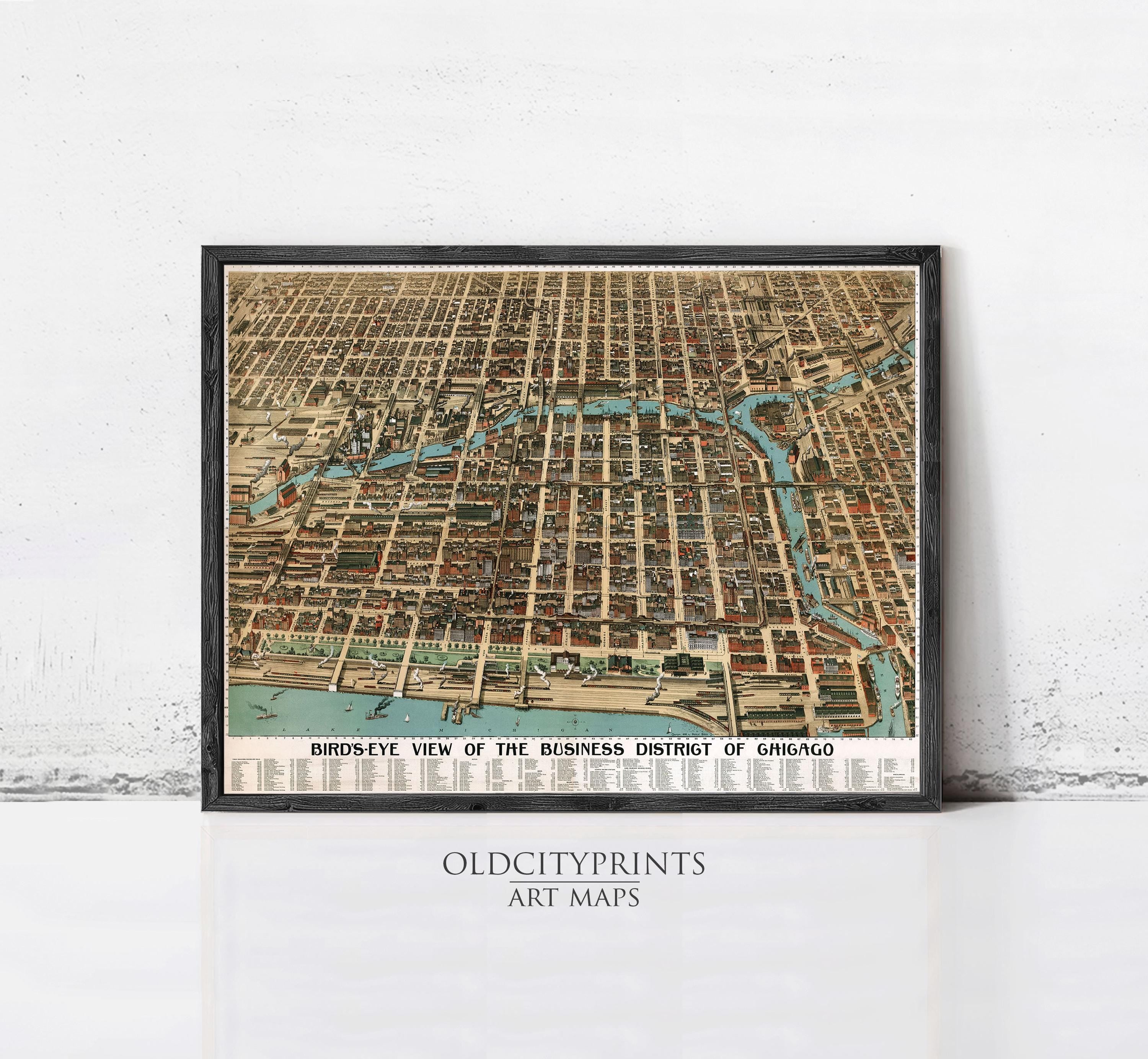The image is a framed vintage map of Chicago, Illinois, depicting a bird's eye view of the city's business district.