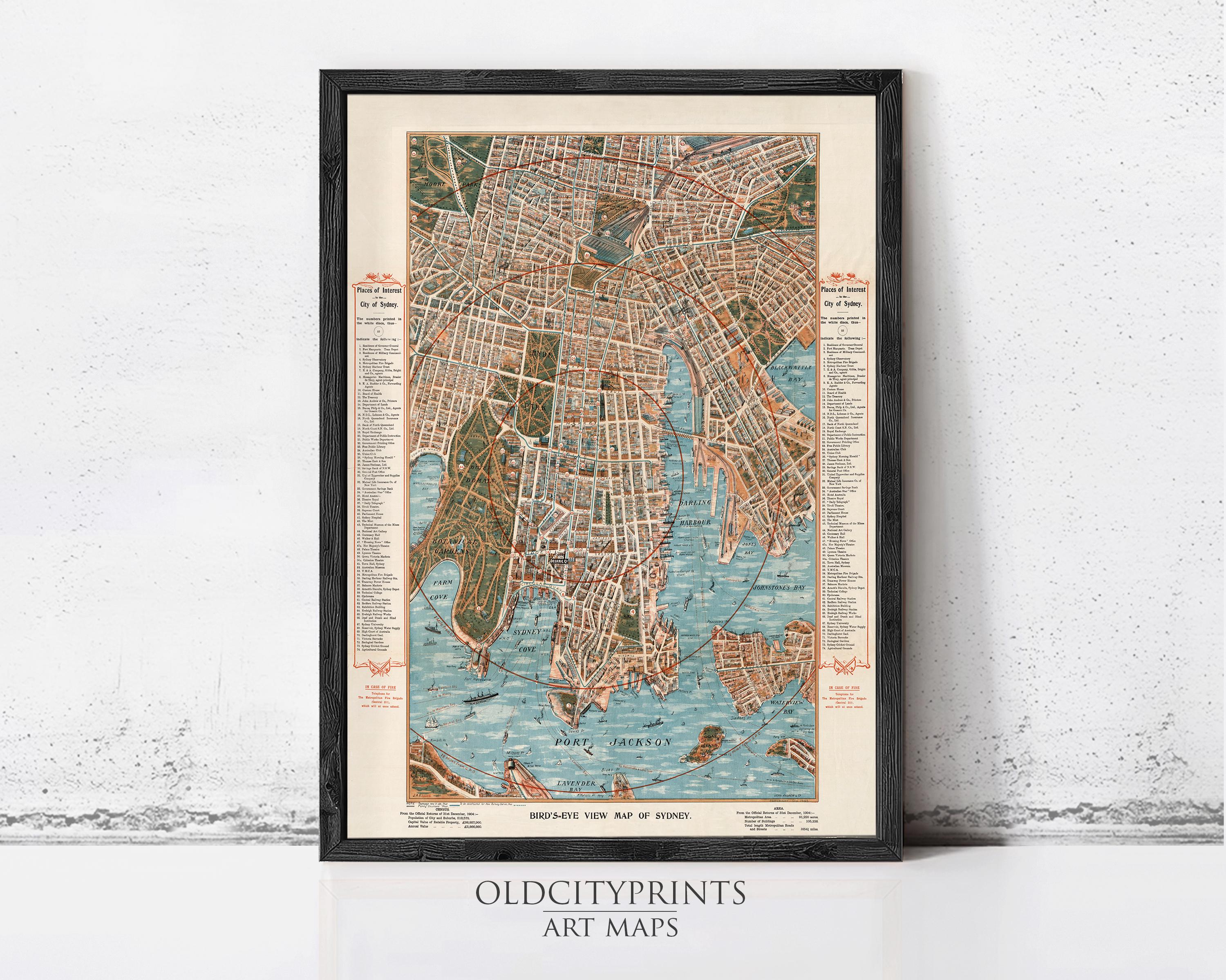 The image is a framed vintage map of a city, likely Sydney, Australia, with detailed street names and landmarks.