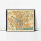 The image is a framed vintage map of Barcelona, Spain, depicting the city's streets and landmarks.
