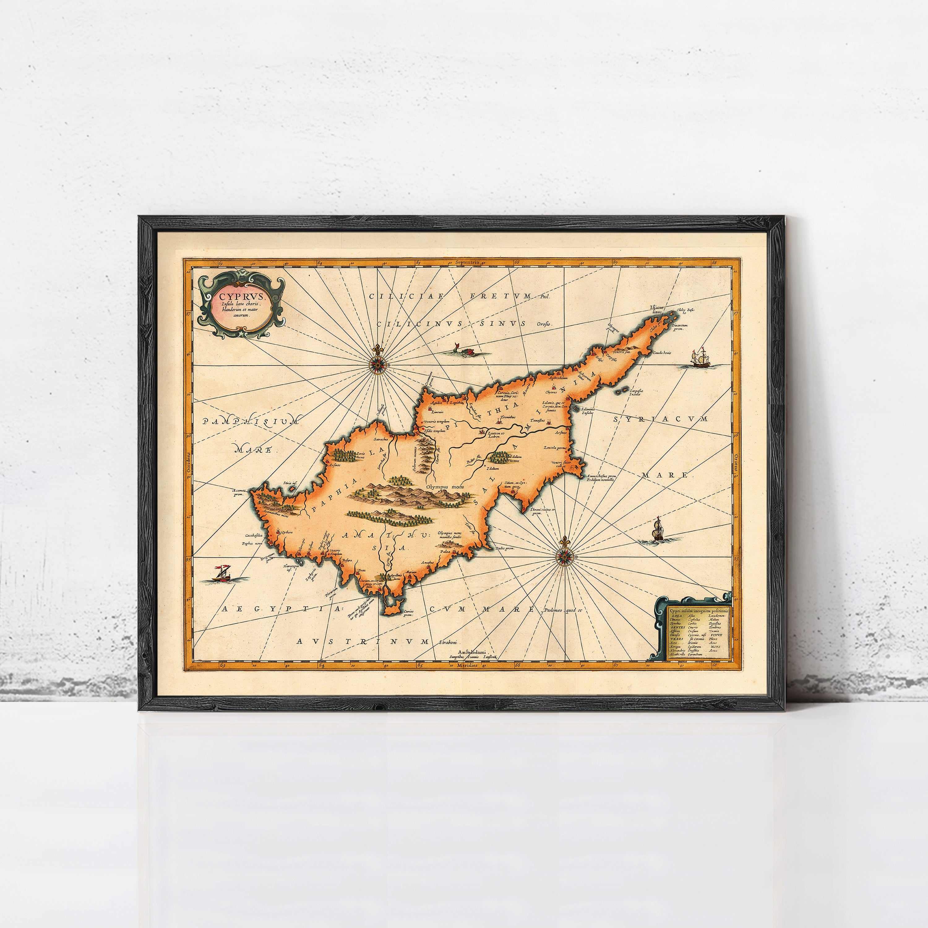 The image is a framed vintage map of the island of Cyprus, depicting the country's geographical layout and surrounding areas.