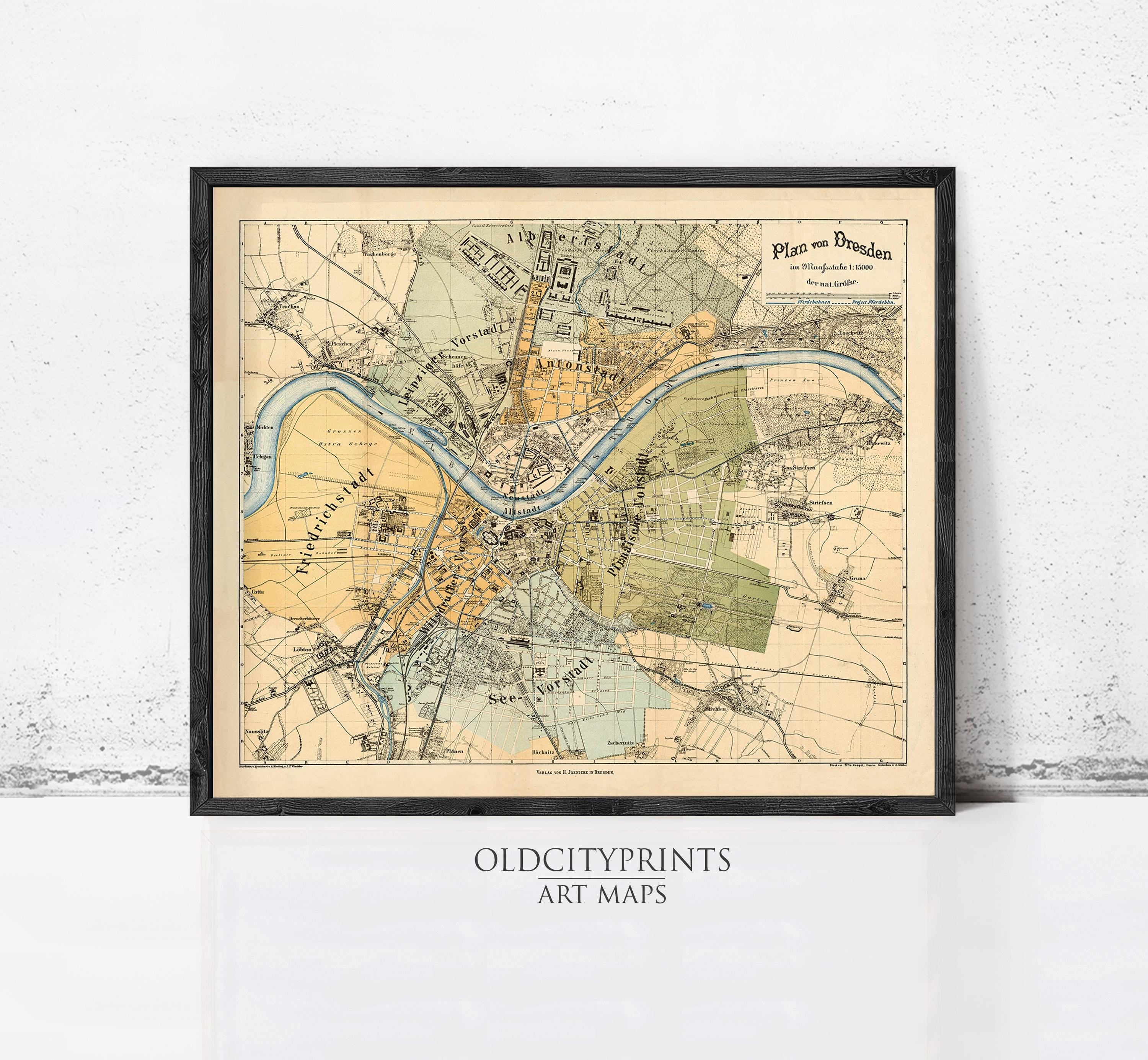 The image is a framed vintage map of a city, likely from the 19th century, depicting various landmarks and geographical features.