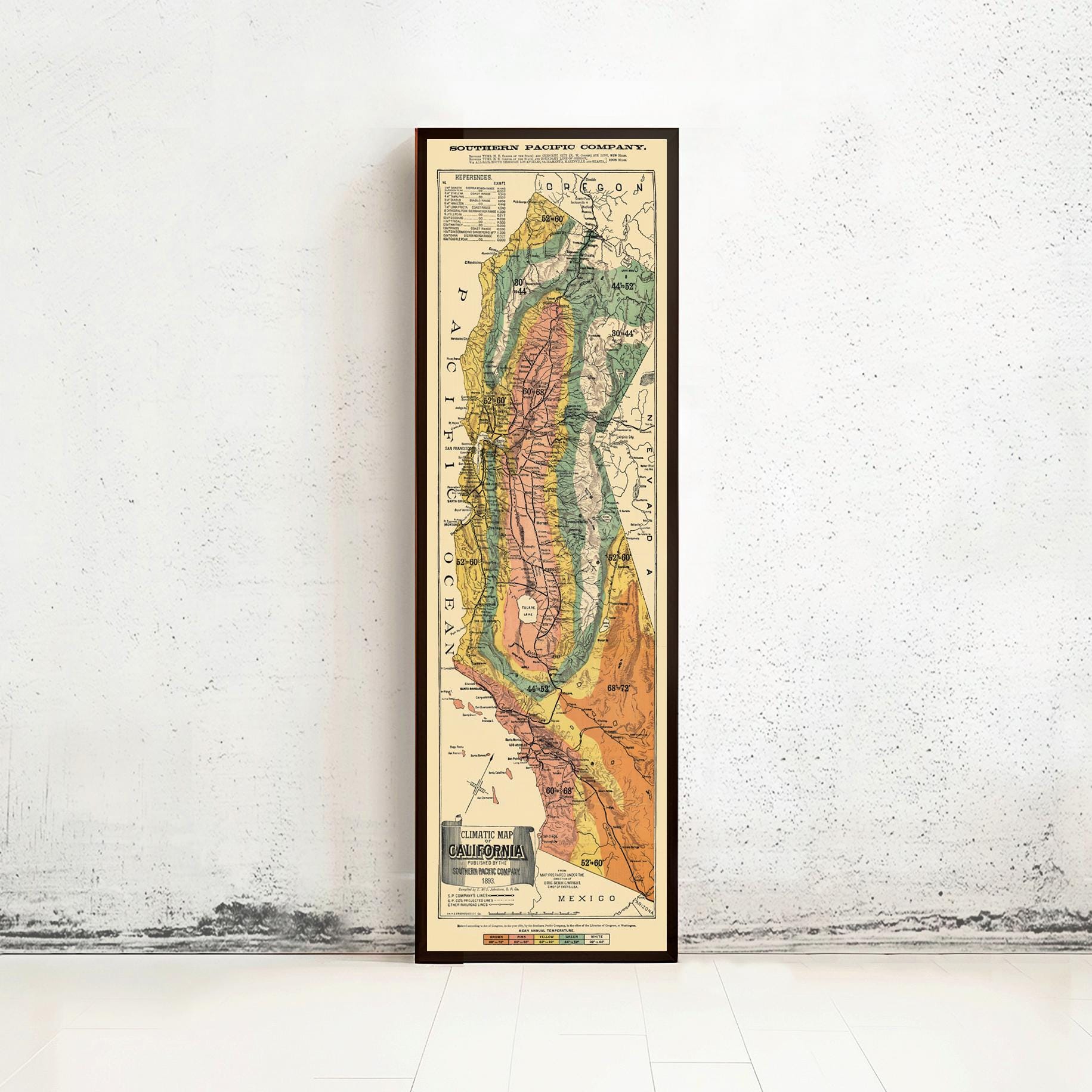 The image is a framed vintage map of California, showing the state's geographical features and boundaries.