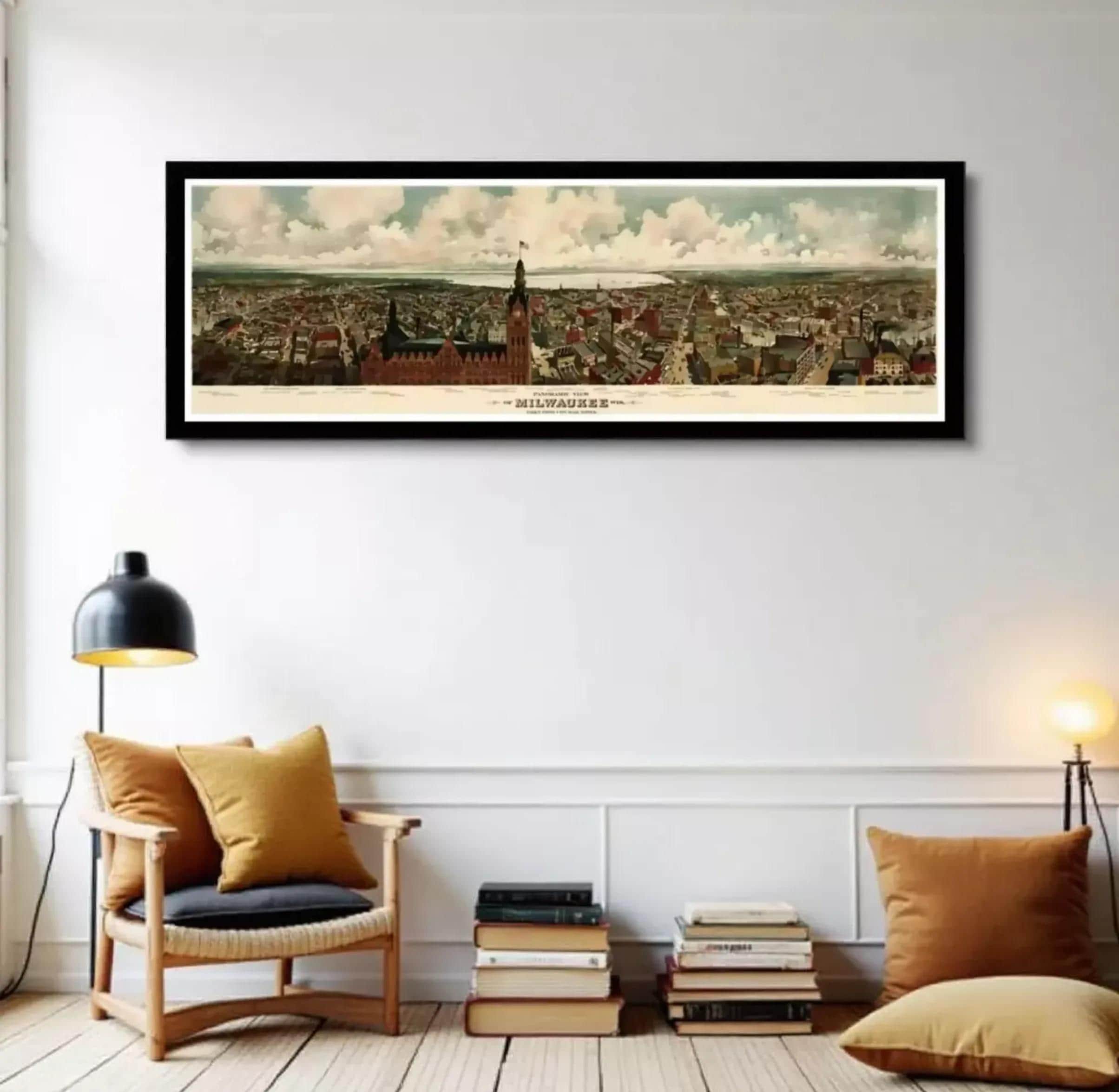 A framed painting of the Milwaukee skyline, featuring a cityscape with various buildings and landmarks.
