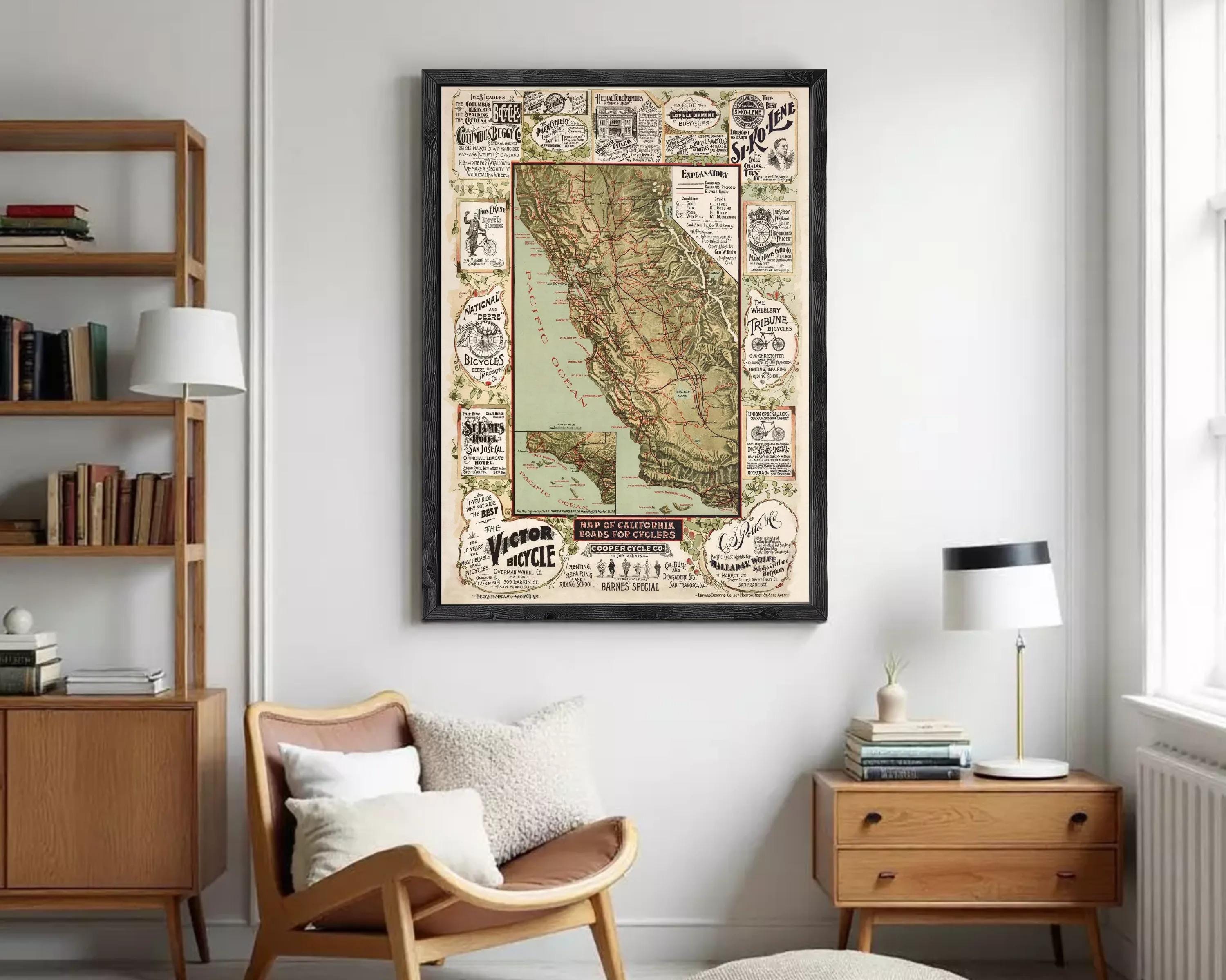 The image is a framed vintage map of California, featuring various advertisements and illustrations related to cycling and transportation.
