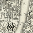 The image is a detailed historical map of a city, showing streets, buildings, and a river.