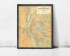 The image is a framed vintage map of Budapest, Hungary, depicting the city's streets and surrounding areas.