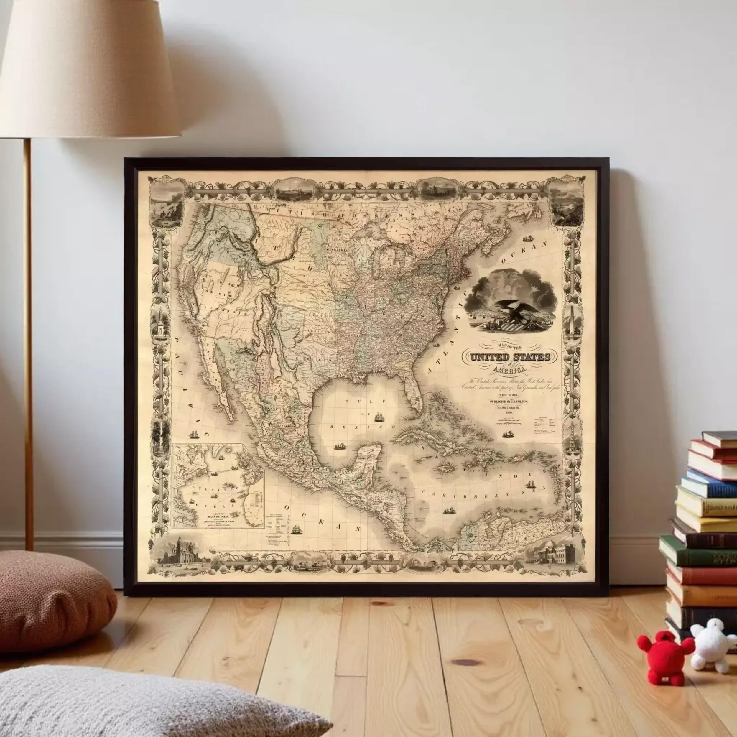 a framed antique map of the United States, with a wooden floor and a lamp in the background.