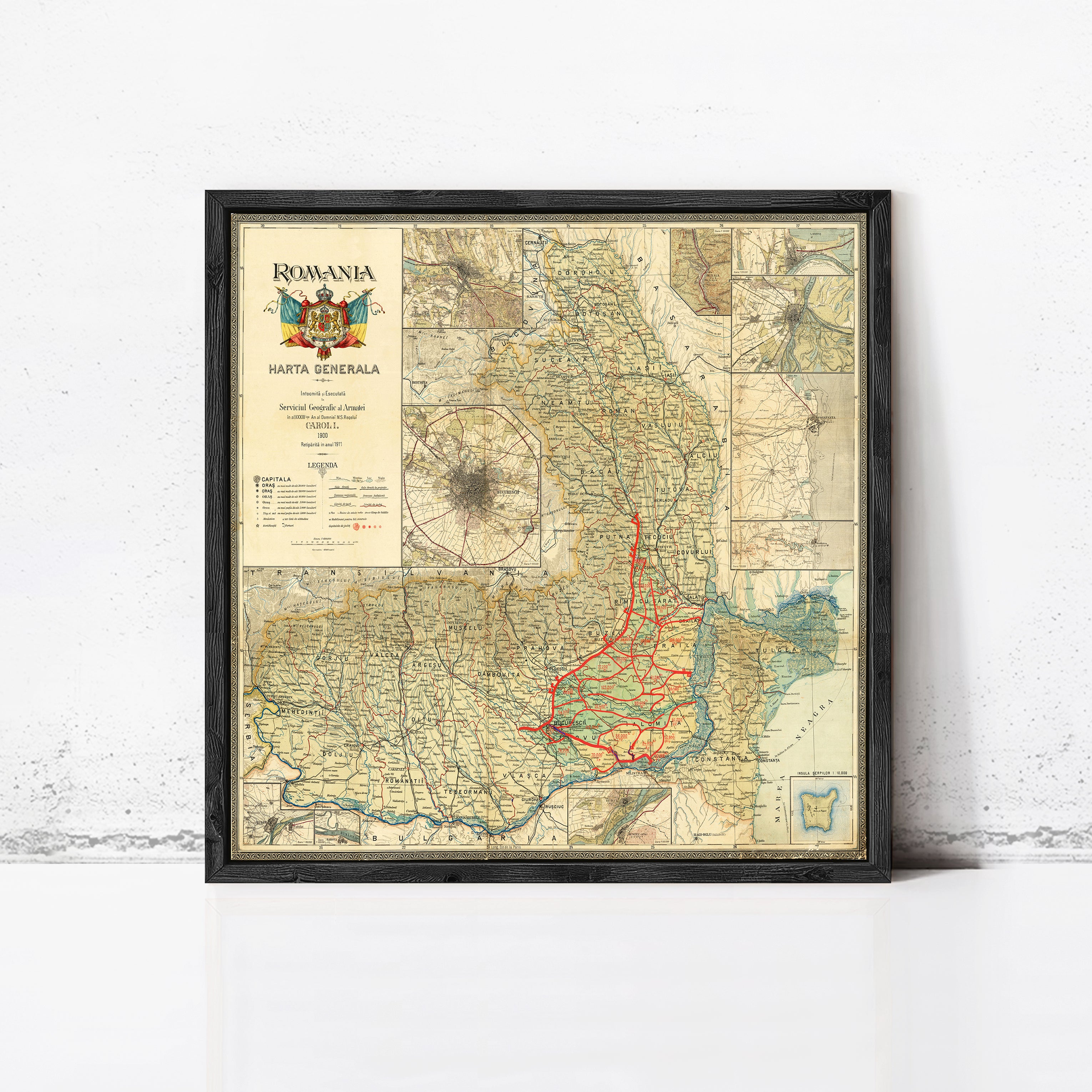 The image is a framed map of Romania, showing the country's geographical layout and major cities.
