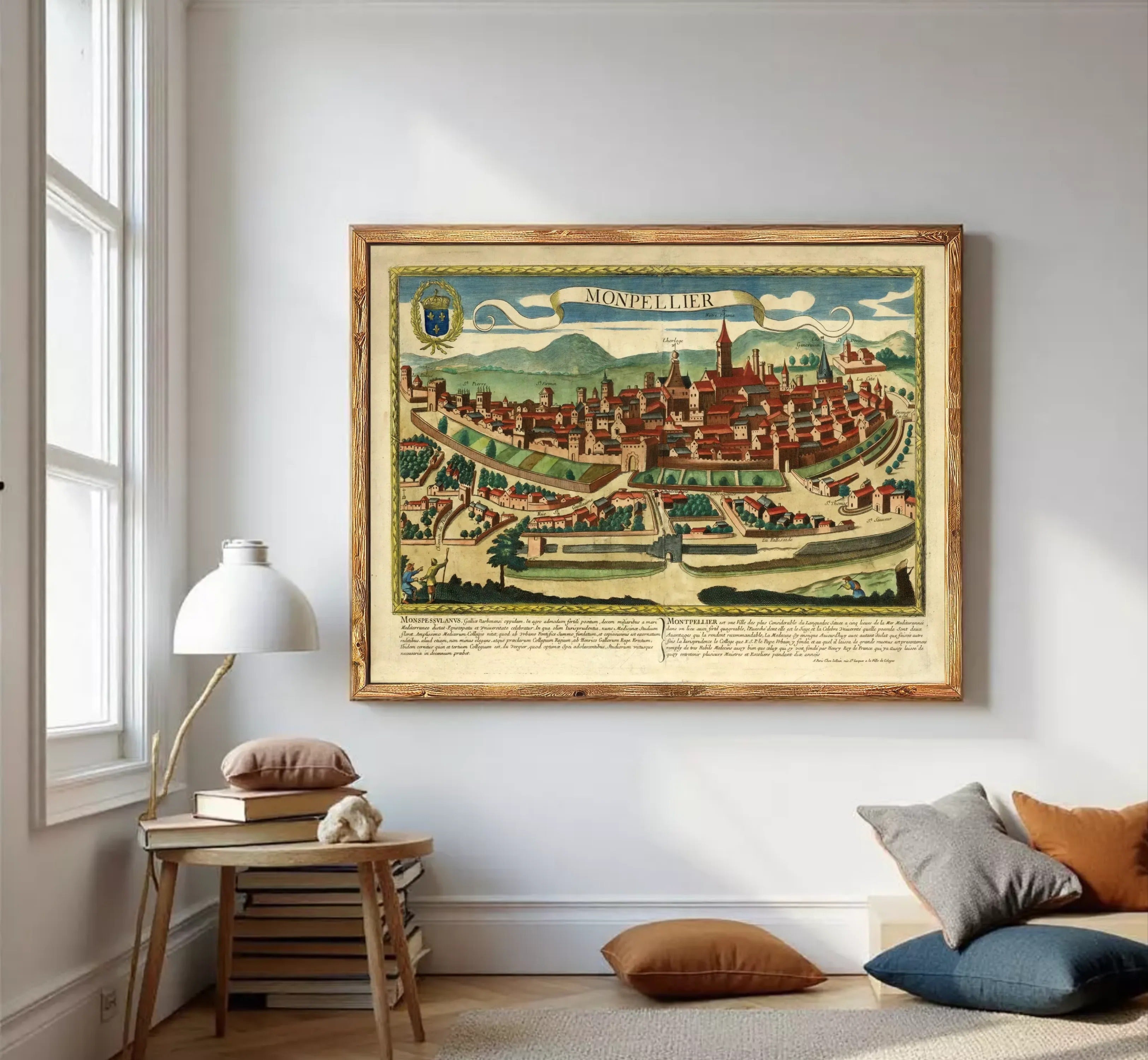The image is a framed vintage map of a city, depicting a detailed and colorful illustration of the city's layout and surrounding landscape.