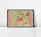 The image is a framed map of a city, likely a historical or geographical map, displayed on a wall.