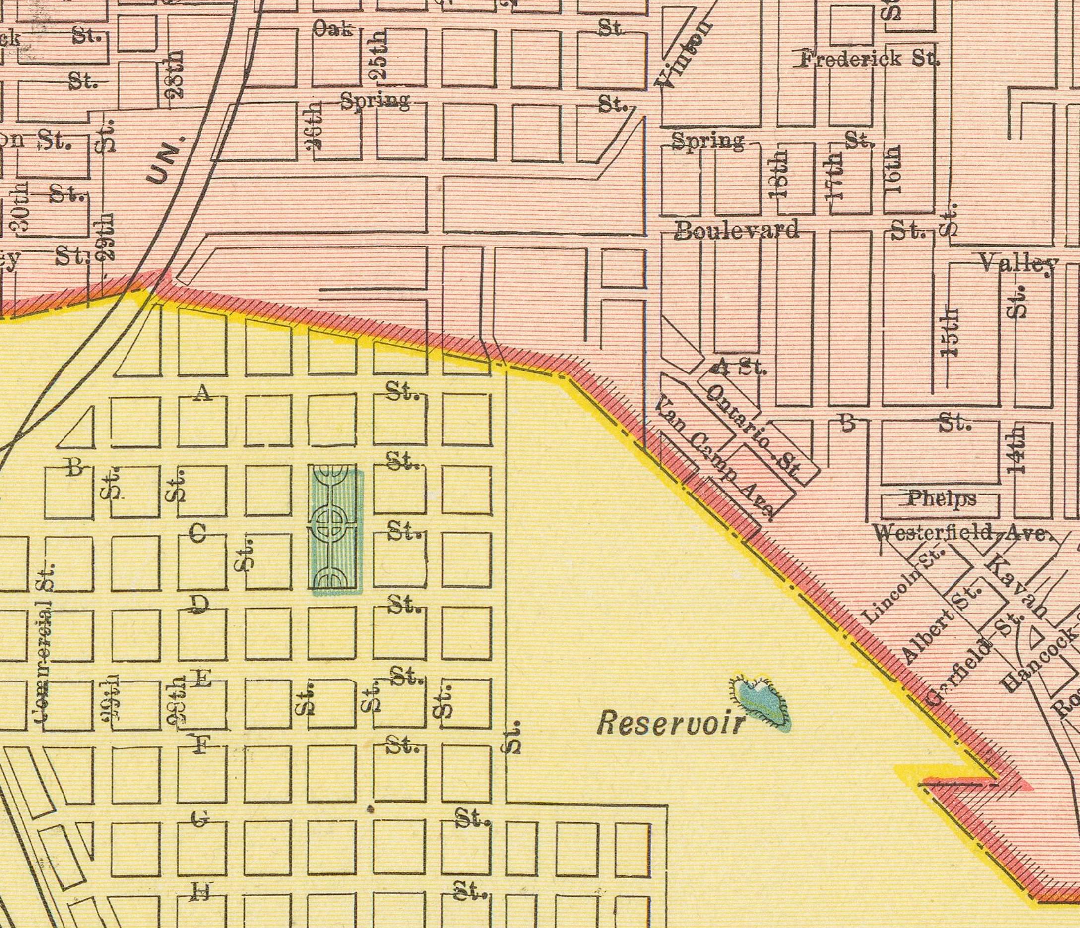 The image is a historical map of a city, showing streets, buildings, and other urban features.