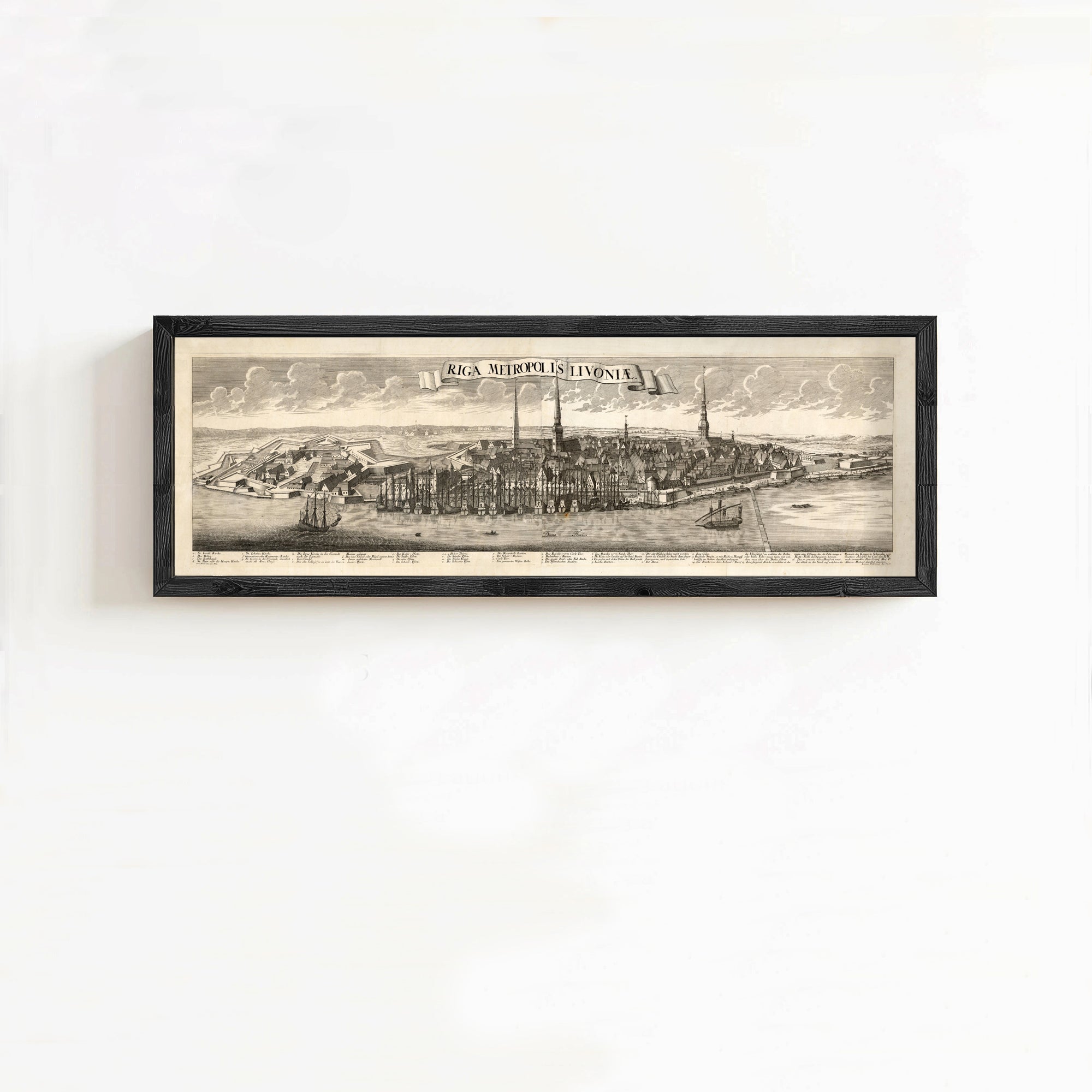 The image is a framed print depicting a cityscape, likely from the Ottoman Empire, with various architectural elements and landmarks.