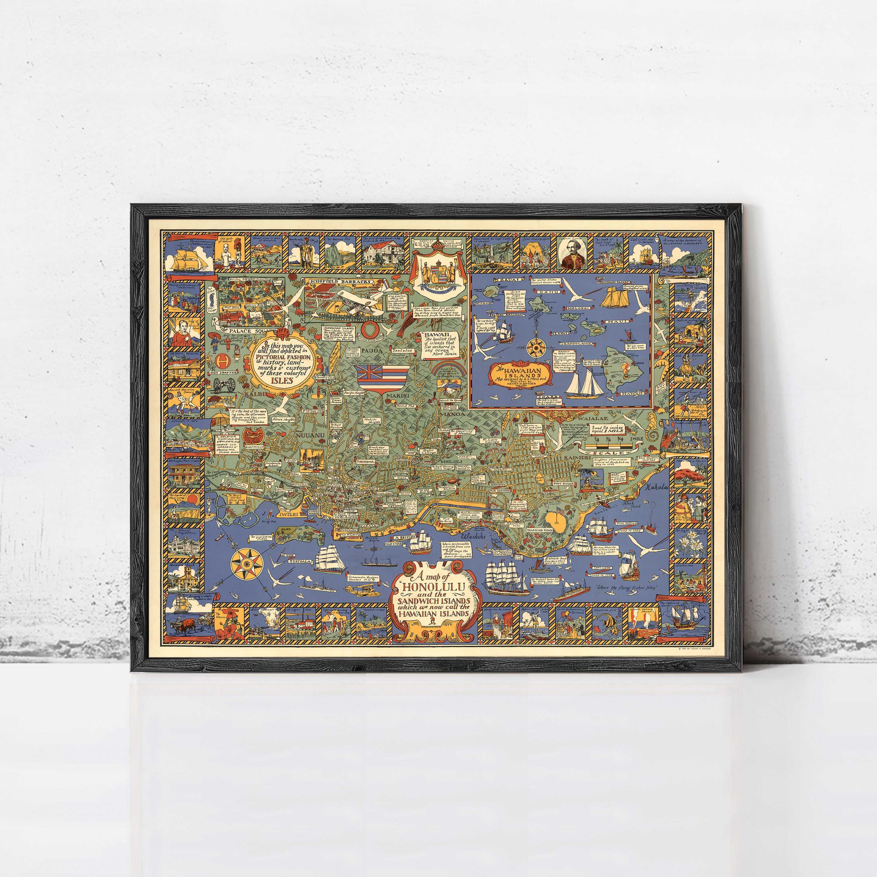 The image is a framed vintage map of the United States, featuring various landmarks, symbols, and illustrations in a colorful and detailed manner.