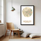 A framed map of Kansas City, with the city's location and coordinates provided.